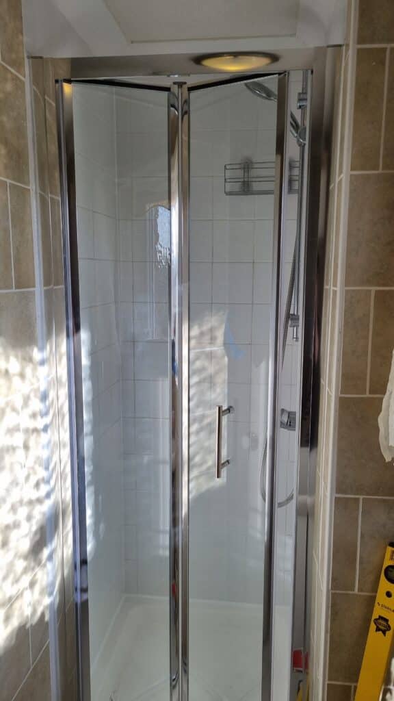 New shower door and tiling, handyman